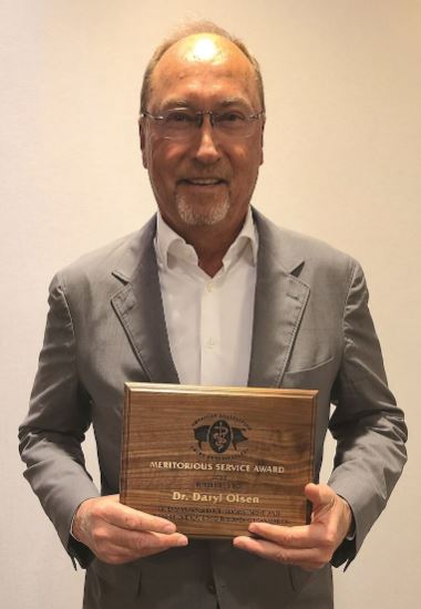 Olsen receives AASV Meritorious Service Award 