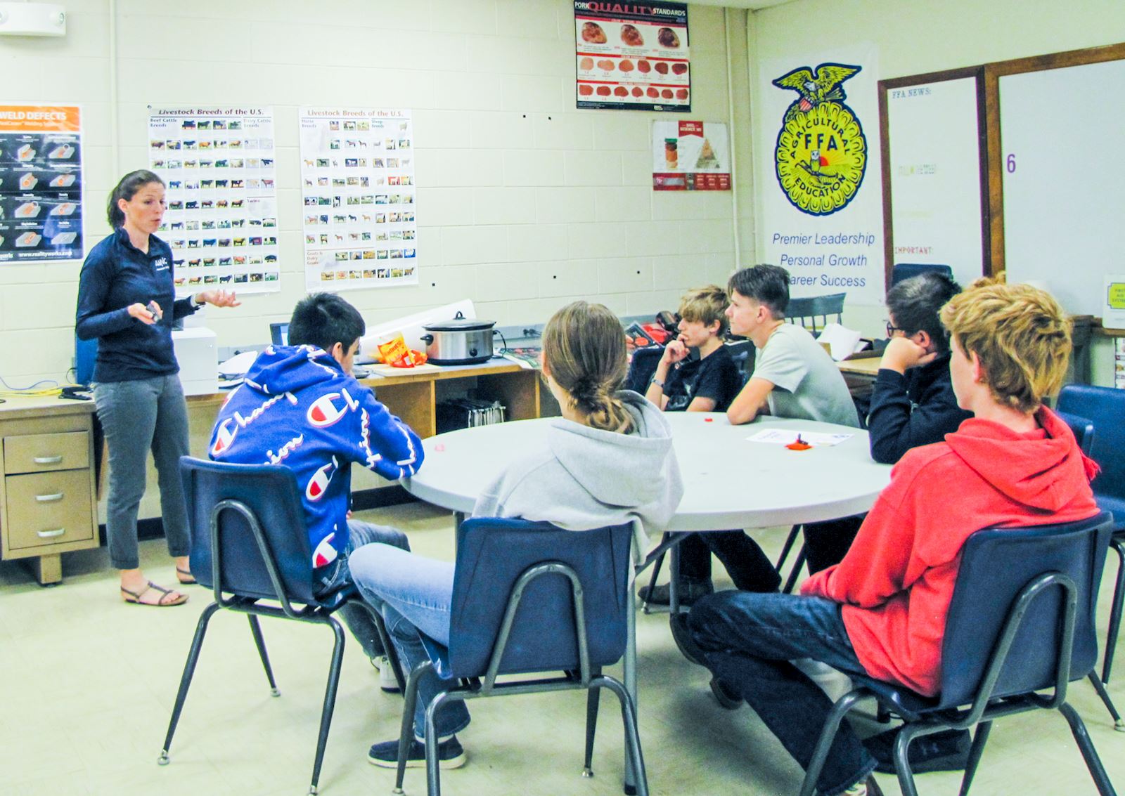 Holly High School student learn about pig farming from AMVC