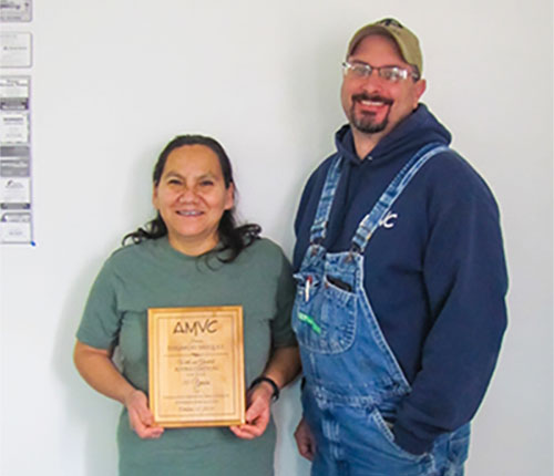 Nancy Diaz accepts plaque