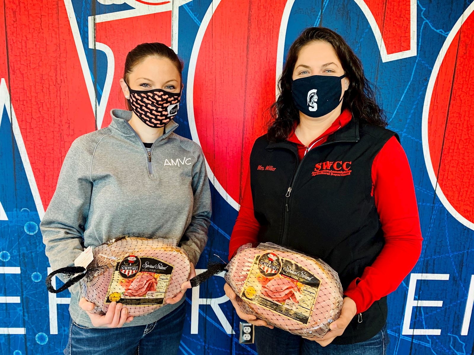 AMVC gives hams to SWCC teacher