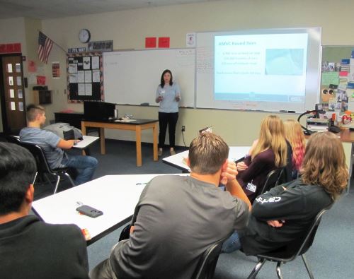 Warsaw students learn about pig farming